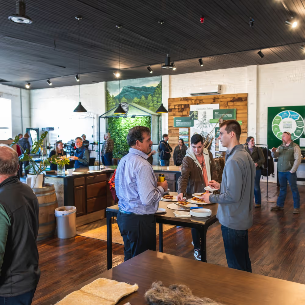 Community gathering inside Friendly City Food Co-op