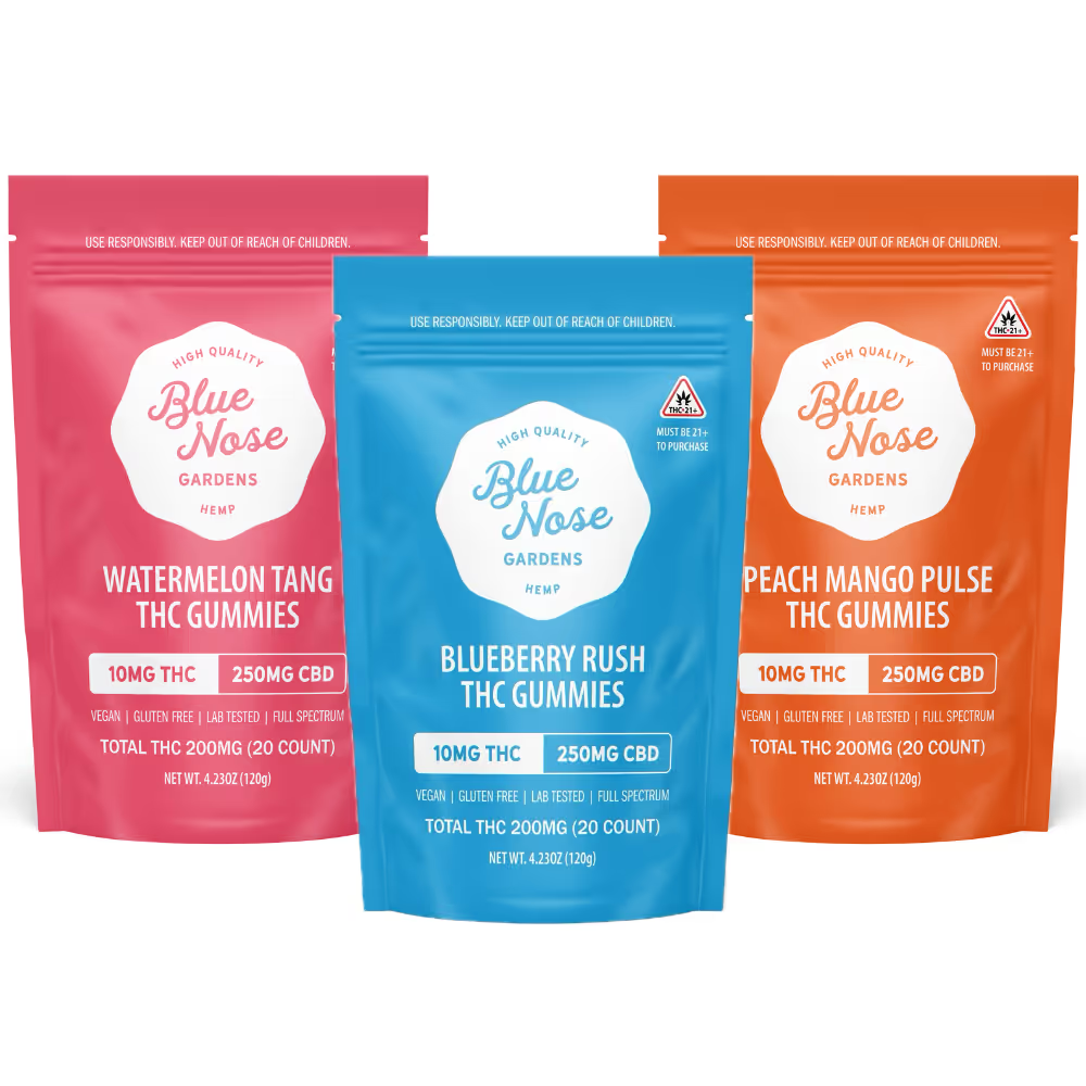 Three Blue Nose THC gummy flavors in colorful packages