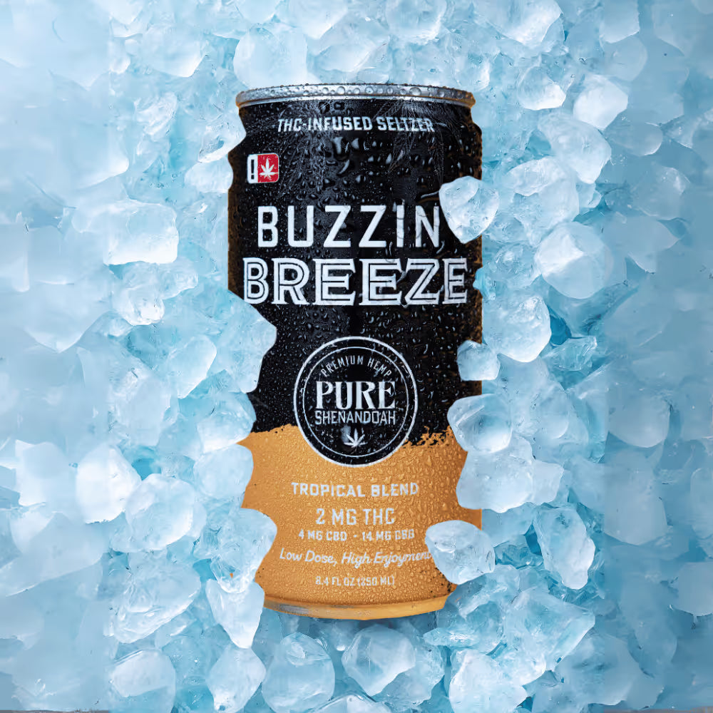 Buzzin Breeze THC seltzer can surrounded by crushed ice