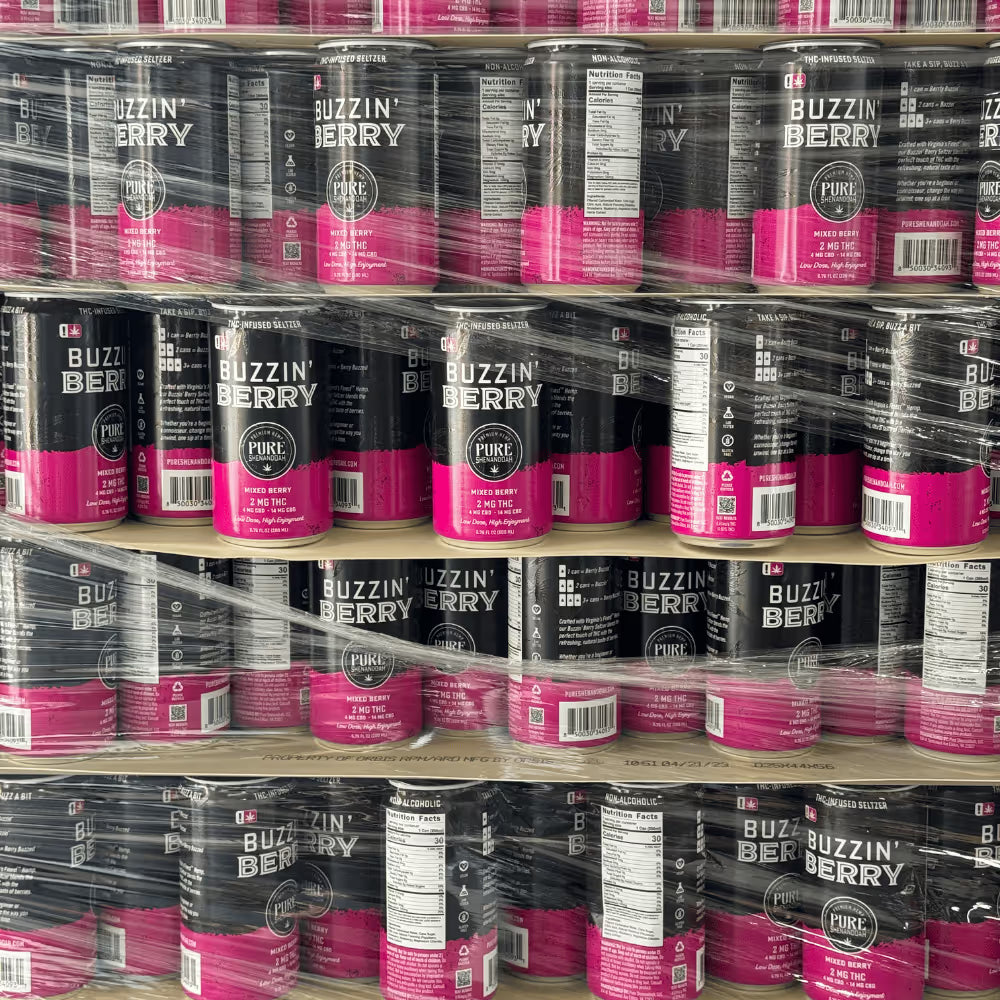 Retail display stacked with Buzzin Berry THC seltzer cans