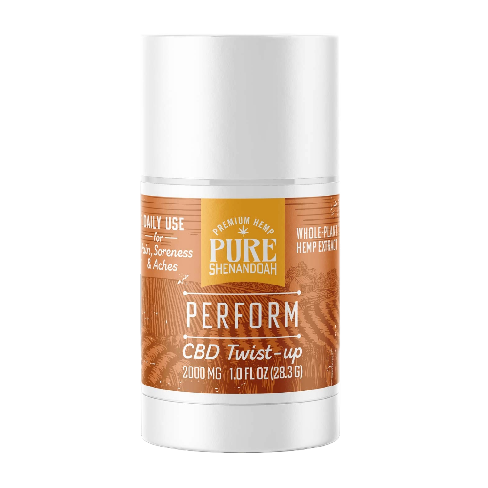 Pure Shenandoah Perform CBD Twist-up in white container with orange wood-grain label, 2000 mg CBD, 1 oz (28.3 g) stick format.