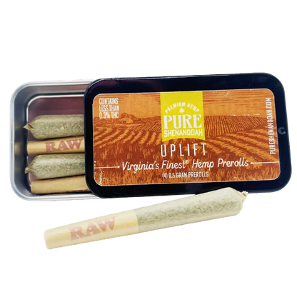 Pure Shenandoah Uplift Pre-Rolls tin, open with visible hemp joints and one pre-roll placed in front, orange and yellow packaging labeled "Virginia’s Finest Hemp Prerolls," four 0.5 g pre-rolls.