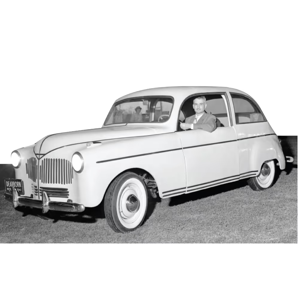 Henry Ford with the first hemp car released in 1941, showcasing hemp-based materials in automotive history.